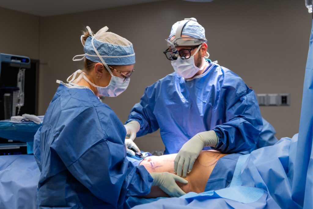 Dr Jacob Bloom and Meg Hosking PA-C performing abdominoplasty tummy tuck with liposuction in Chicago